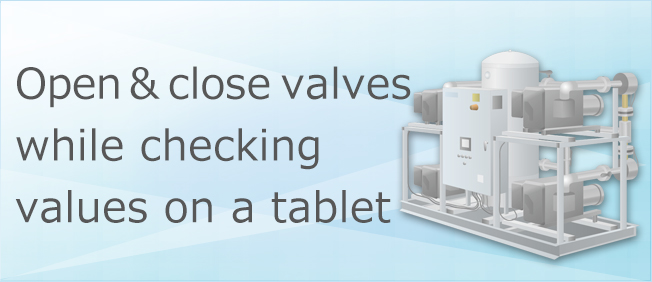 Open and close valves while checking values on a tablet.